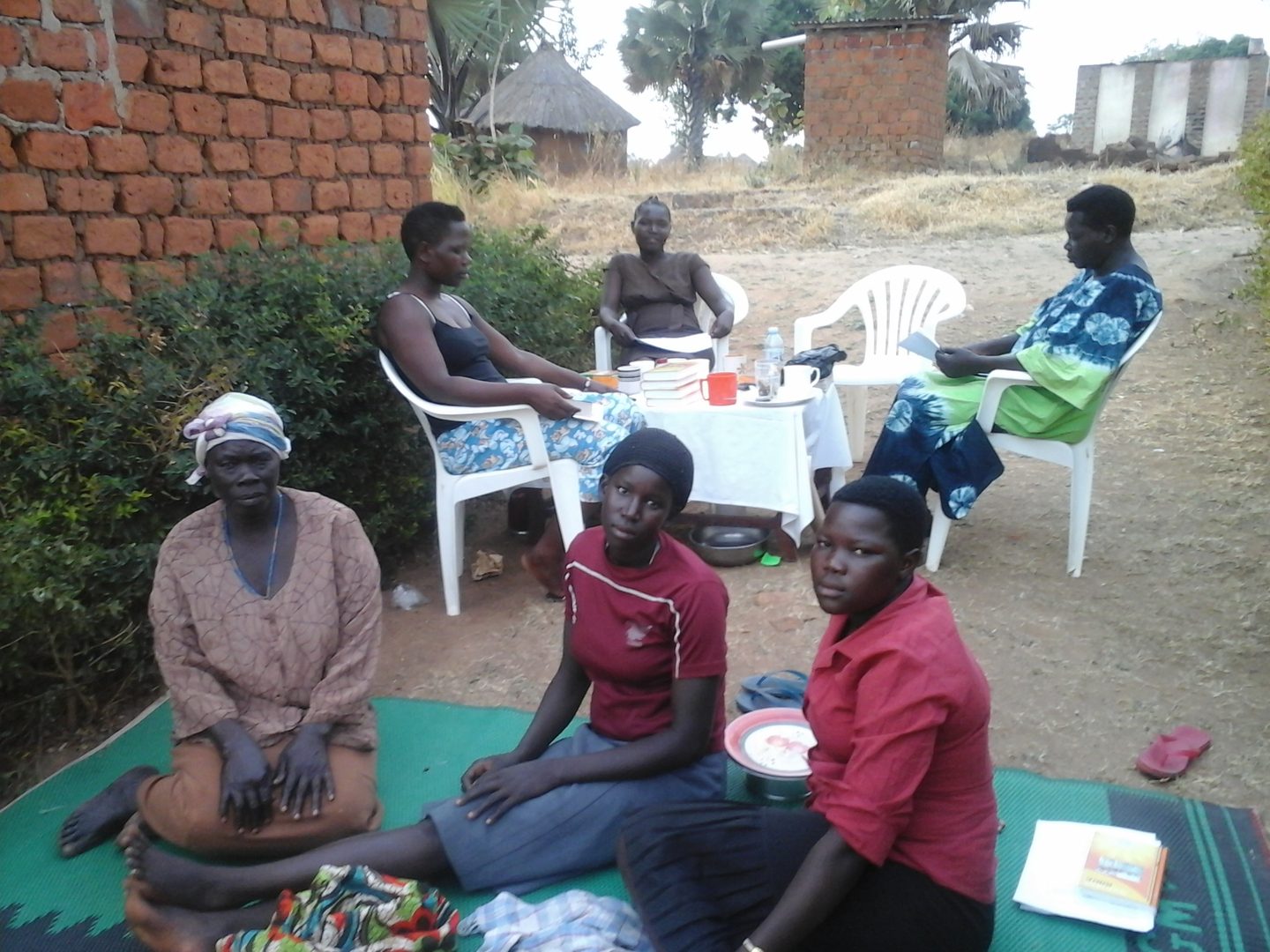 Women gathered outdoors for a leadership session